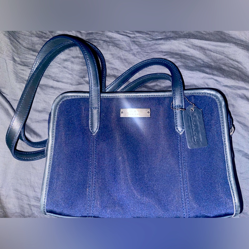 Blue Coach bag with bronze embellishments